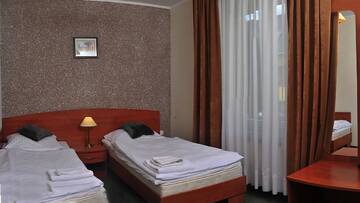 Фото номера Двухместный номер с 1 кроватью или 2 отдельными кроватями Отель Hotel Paradiso г. Suchedniów 4